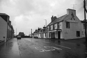 Main Street showing former Royal Hotel and junction with Church Street, Ballantrae, South Ayrshire 
