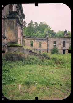 View from SE showing remains of front steps, quadrant screen wall and pavilion, Mavisbank House.