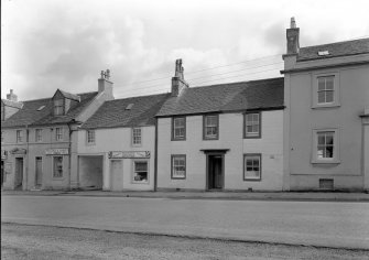 General view of 16-19 Montgomerie Street, Eaglesham from north east.
