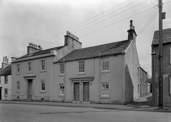 General view of 21-22 Montgomerie Street, Eaglesham, from north west.