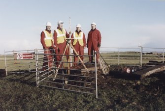 Commission at work: survey team (L to R - Mr Ian Parker, Mr Rob Shaw, Mr Dave Cowley and Mr John Keggie) at entrance to subterranean structure.