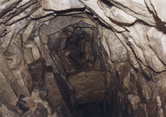 View looking up into corbelled roof of the cistern (lower chamber).