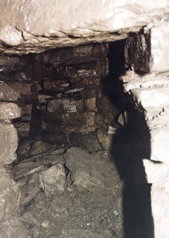View along smaller, or lower, side gallery which opens out from half landing.