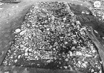 Kebister excavation archive
36  negatives of the teind barn and kiln under excavation, plus a clearance cairn and a turf dyke:
2-4: Clearance cairn (526) within Area II.
5-6: Turf dyke, aligned E-W.
7-8: Enthusiastic archaeologists on a Sunday outing.
9-20: Area I (teind barn) under excavation, taken from the W.
26-29: Detail of kiln in Area I.
30-31: Interior of the teind barn - detail of the passageway.
32-33: Detail of the flue (27) within Area I.
36-37: Detail of the flue (16) within Area I.