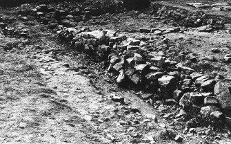 Excavation photograph : from east - rooms 7 and 8 in background and intervallum road.