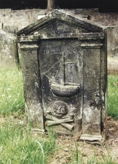 Tulliallan, Old Parish Church, burial ground.
General view of gravestone with pillaster supporting pediment. Sailing ship, skull and crossed bones
Insc: '1773. I.S (loveheart) H.H' and 'D.S, A.C'.
