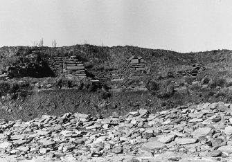 Photographic survey of cliff erosion. Boat nausts.