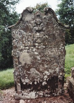 Glendevon Parish Church, Churchyard.
General view of gravestone with curved broken pediment with urn and fluted panel below.