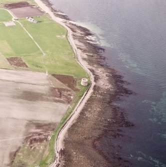 Hoy, Crockness, oblique aerial view, taken from the SE, centred on the Martello Tower. A curving linear soilmark is visible in the centre left of the photograph.