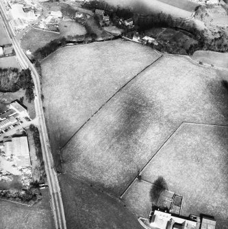 Oblique aerial view of perimeter site centred on NS 803 898.