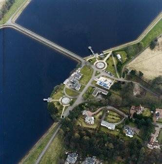 Oblique aerial view of Mugdock (NS57NE.63) and Craigmaddie (NS57NE.61) Reservoirs including Mugdock Straining Well (NS57NE 63.05) and Chlorinating House  (NS57NE 63.04)