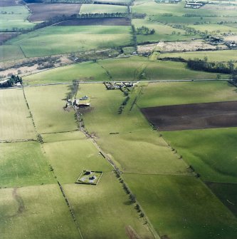 Oblique aerial photograph of Ballat 1855 and 1885 Water Chambers and 1855 and 1885 valve houses and compound, with A811 Balfron Station A811 Syphon and Pipe Bridges beyond