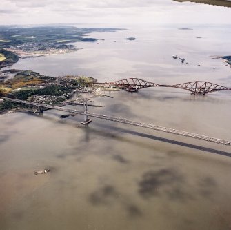 General oblique aerial view looking across the bridges and North Queensferry towards Dalgety Bay, the Firth of Forth and Inchcolm Island, taken from the WSW.