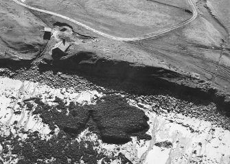 Aerial photograph of site.  Plate ii, p84 GAJ 1985 vol.2  Mound site at Skaill.