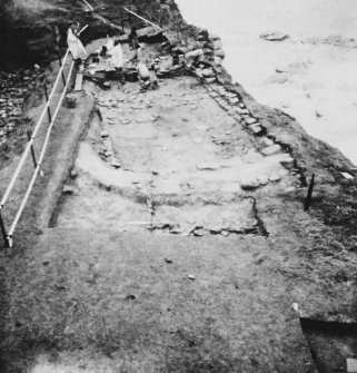 Area V 1980 excavation photograph.  Detail of circular feature from W.