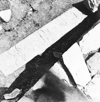 Illus 171 p225 Vesarp Report.
Grave stone decorated with double-crosses during the 1930s excavations of area 1 Brough of Birsay from above.