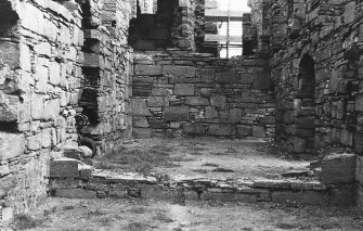 Excavation photograph : west range - room 1 before excavation, from south.
