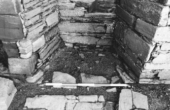 Excavation photograph : south range - room 2 window, from south.