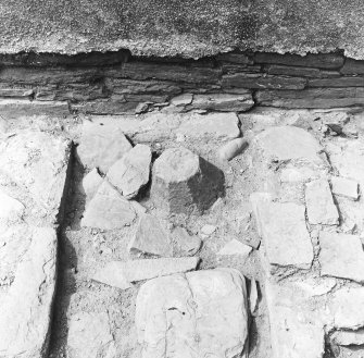 Carved stone in situ.
