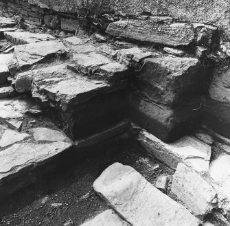 Excavation trench along base of church wall.