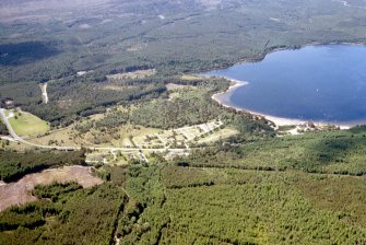 Aerial view of Loch Morlich Campsite and Visitor Centre, near Aviemore, looking S.