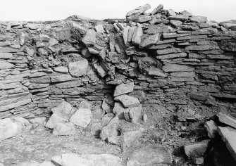 Wall of broch tumbling into north-west.