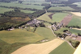 An oblique aerial view of Croy, Nairnshire, looking SSW.
