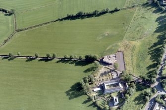 An oblique aerial view of Balloan Farm and Culduthel Court, Inverness, looking SW.