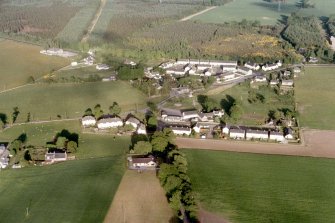 An oblique aerial view of Croy, Nairnshire, looking SE.