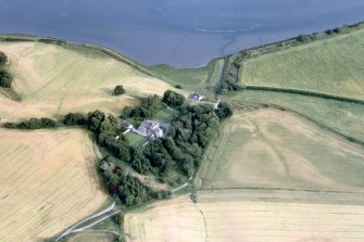 An oblique aerial view of Tarradale House, Beauly Firth, Easter Ross, looking SSE.