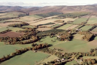 Oblique aerial view of Fasque and the hills of the Mounth, near Laurencekirk, Aberdeen-shire, looking NW.  