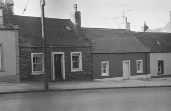 View of nos. 127, 129 George Street, Whithorn, from south east.