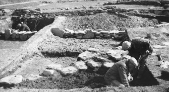 Publication Photograph: Excavation of lower slope communal peat ash midden.