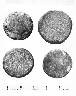 Publication Photograph: Decorated stone discs.