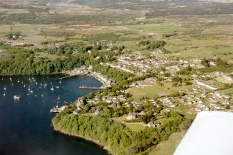 Oblique aerial view of Tobermory and its hinterland, Isle of Isle of Mull, looking S.