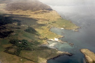 Oblique aerial view of Galmisdale and Kildonan, Isle of Eigg, looking NE. 