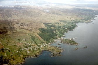 Oblique aerial view of Ardvasar, Armadale, and the grounds of Armadale Castle, Isle of Skye, looking N.