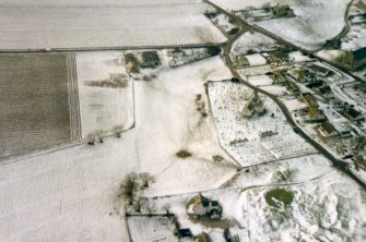 An oblique aerial view of Portmahomack, Tarbat Ness, looking W.