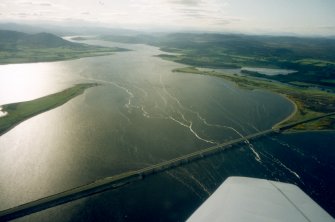 An oblique aerial view of the Dornoch Firth Bridge, Sutherland, looking NW.