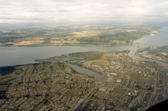 An oblique aerial view of the Caledonian Canal's Muirtown Basin, Inverness, looking N.