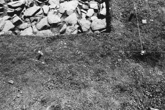 Excavation photograph : trench H - platform - E77-79, N68-69.

(see MS/682/120 for detailed description)