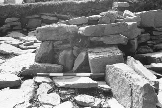 Excavation photograph : trench Aa - detail showing end of wall L40.

(see MS/682/120 for detailed description)