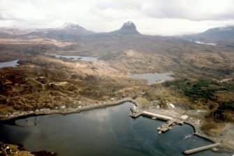 Aerial view of Lochinver, Assynt, looking SE.