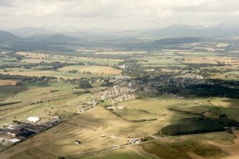 Aerial view of Muir of Ord, looking NW.