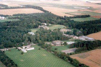 Oblique aerial view of Gordonstoun School and grounds, Moray, looking E.