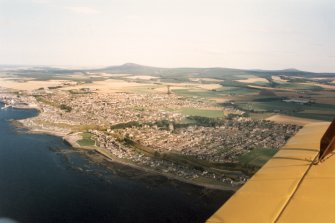 Oblique aerial view of Buckpool and Buckie, Moray, looking E. 