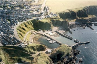 Near vertical aerial view of Portknockie Harbour, Moray, looking SW.