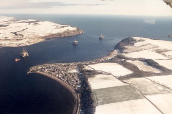 Aerial view of Cromarty with North and South Sutors, Black Isle, looking NE.