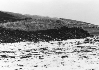 N-S section cut obliquely through broch following JCB damage. Section photographed from E (frame 1)