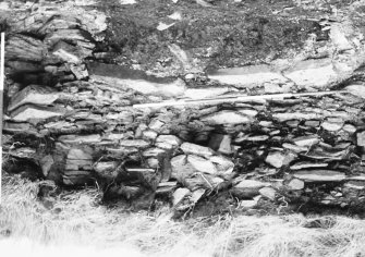 N-S section cut obliquely through broch following JCB damage. Section photographed from E (frame 18)